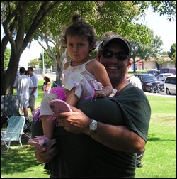 Gene Phillips and Daughter Bella-- Doing the Balancing Act (I do not even want to know)