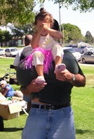 Gene Phillips with Daughter Bella--What is She Sitting On?